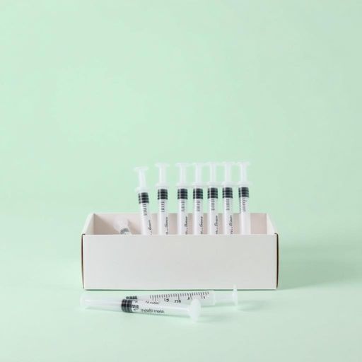 Aussie Peptides Insulin Syringes 31G 1mL — 10 pack — sealed laboratory supply for reconstituting and handling research peptides, photographed on the Aussie Peptides peach studio background. Laboratory supplies Australia, dispatched Australia-wide, research use only.